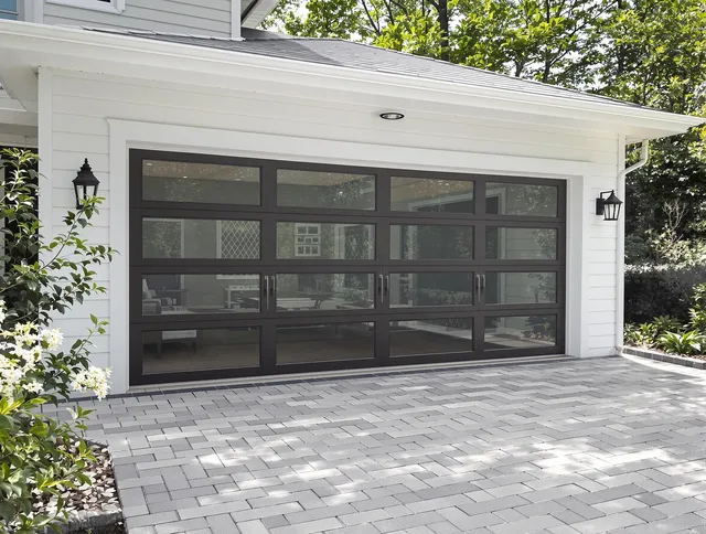 Parma Heights Garage Door Repair design specialist presenting custom garage door options to Parma Heights homeowner